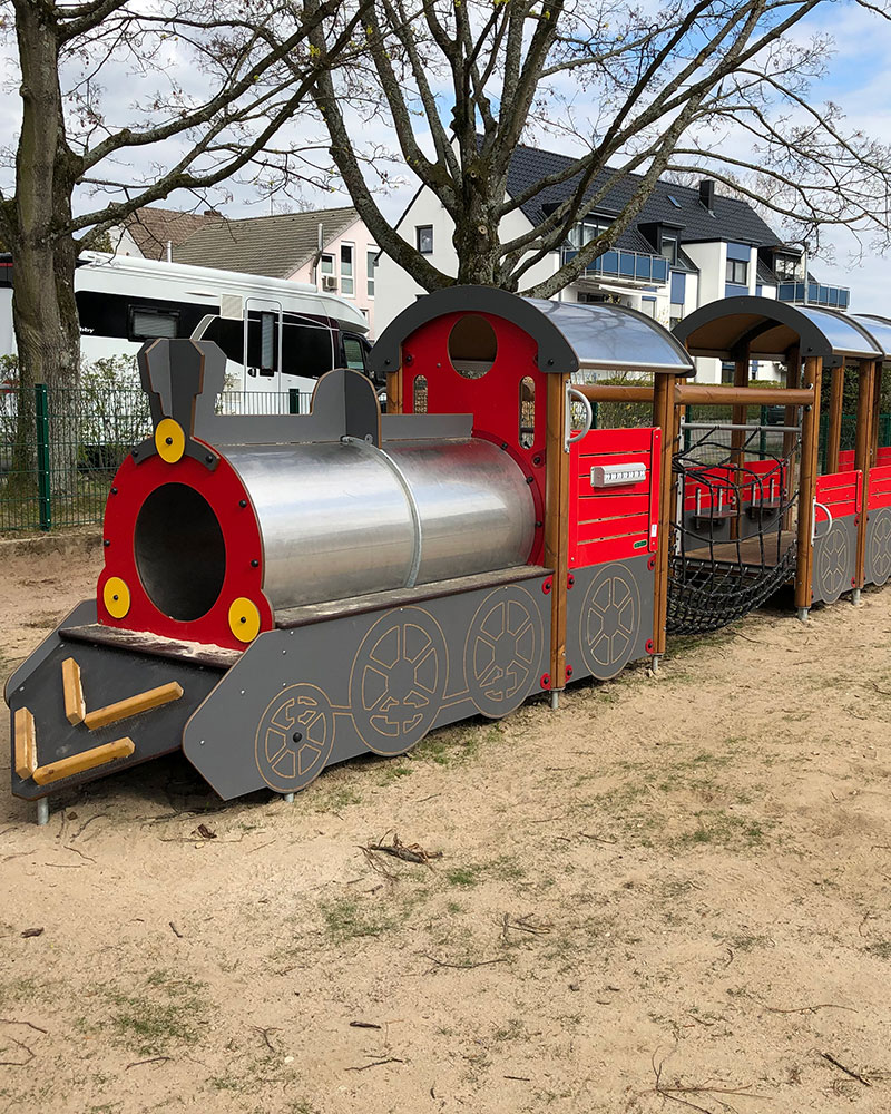 A large train themed playground unit.